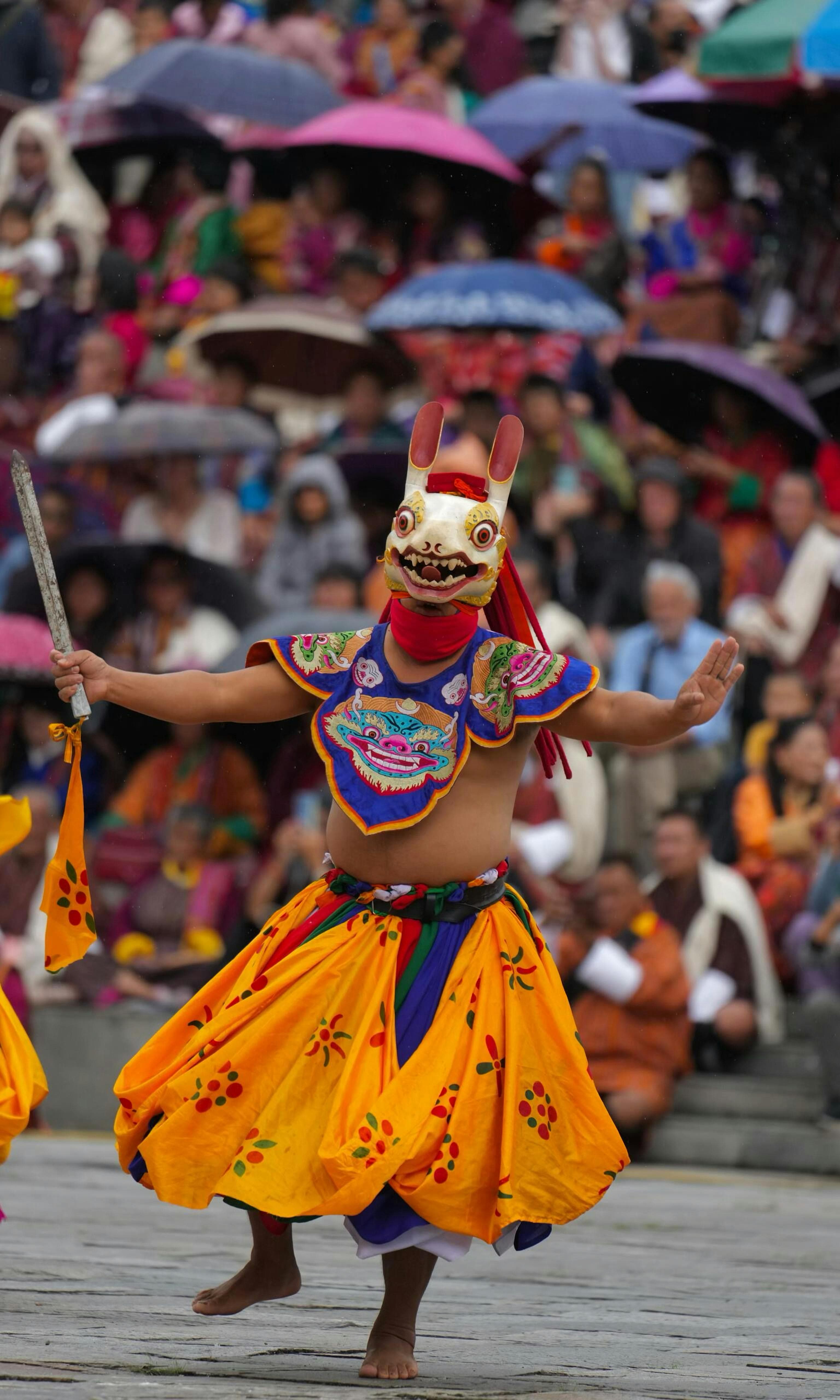 Bhutanese festival ceremony with colourful banners